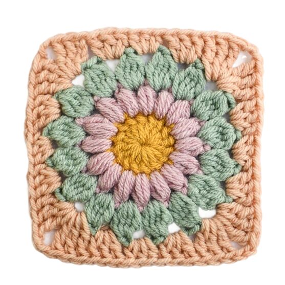 A crocheted sunburst granny square