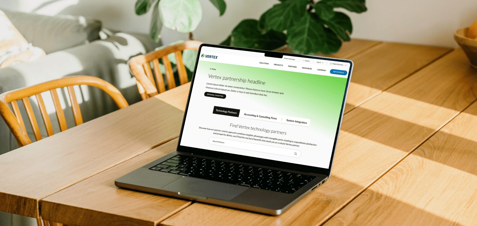 Redesigned Vertex partner page on a laptop